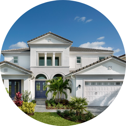 A couple accepts the keys to their new home.